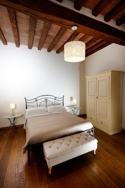 Postel nebo postele na pokoji v ubytování La Corte Dei Sogni B&B