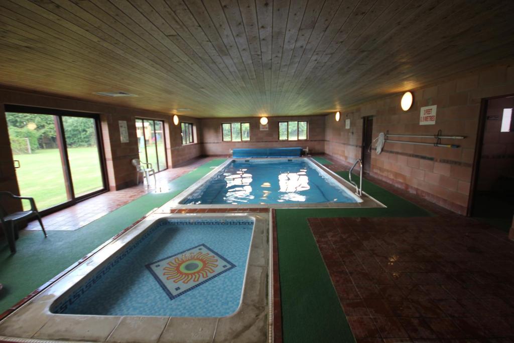 The swimming pool at or near Low Costa Mill 