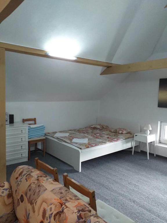 Postel nebo postele na pokoji v ubytování Vila Terezie
