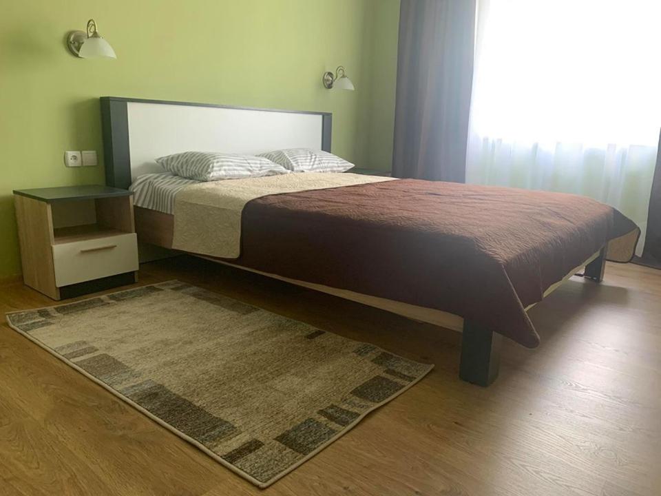Postel nebo postele na pokoji v ubytování Апартаменти Monte