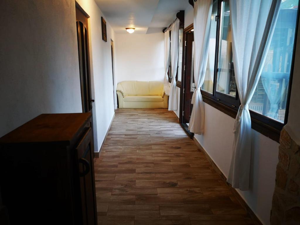Postel nebo postele na pokoji v ubytování Pensiunea Bella Vista