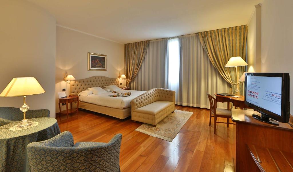 Postel nebo postele na pokoji v ubytování Best Western Hotel Globus City
