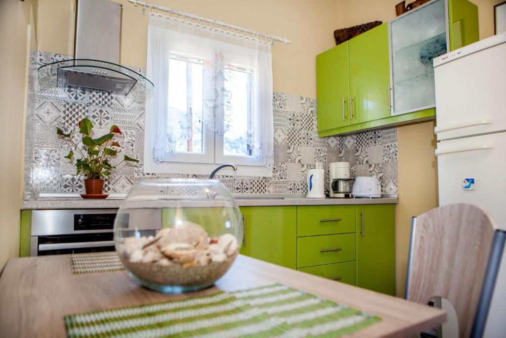 Kuchyň nebo kuchyňský kout v ubytování FilipposResort