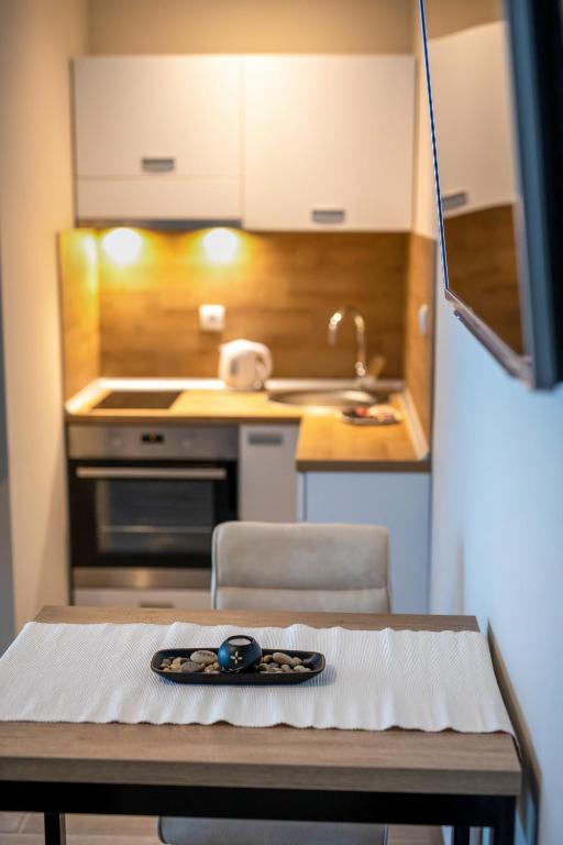 Kuchyň nebo kuchyňský kout v ubytování Annona Apartments