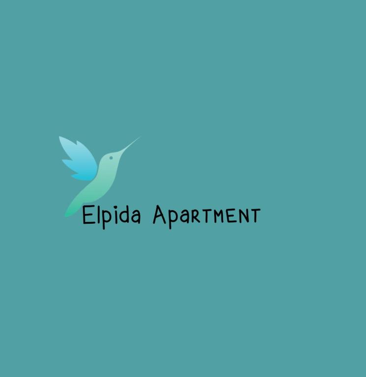 a bird flying in the sky with the wordsipedia appointment at Elpida Apartment in Limenas