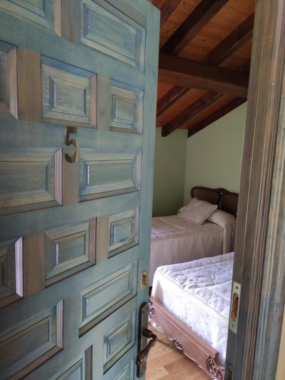 Postel nebo postele na pokoji v ubytování Posada La Casa de Lastras