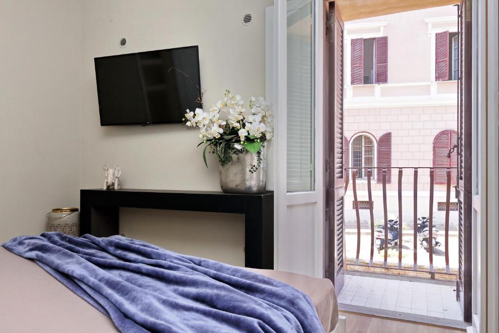 Postel nebo postele na pokoji v ubytování Il Borgo Luxury Suites