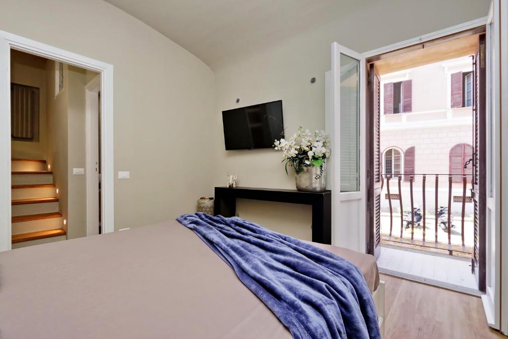 Postel nebo postele na pokoji v ubytování Il Borgo Luxury Suites