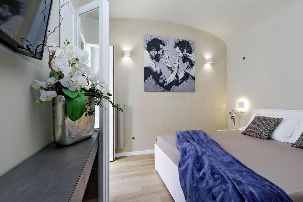 Postel nebo postele na pokoji v ubytování Il Borgo Luxury Suites