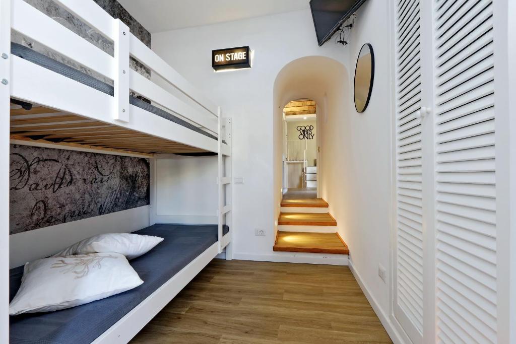 Postel nebo postele na pokoji v ubytování Il Borgo Luxury Suites