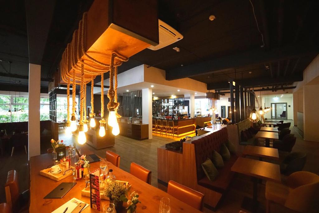 Restaurace v ubytování DIWOTEL by Trip Inn Frankfurt Airport Dreieich