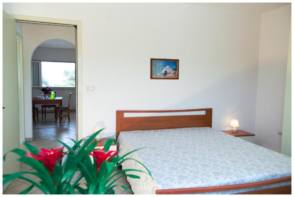 Postel nebo postele na pokoji v ubytování Appartamenti Corciulo