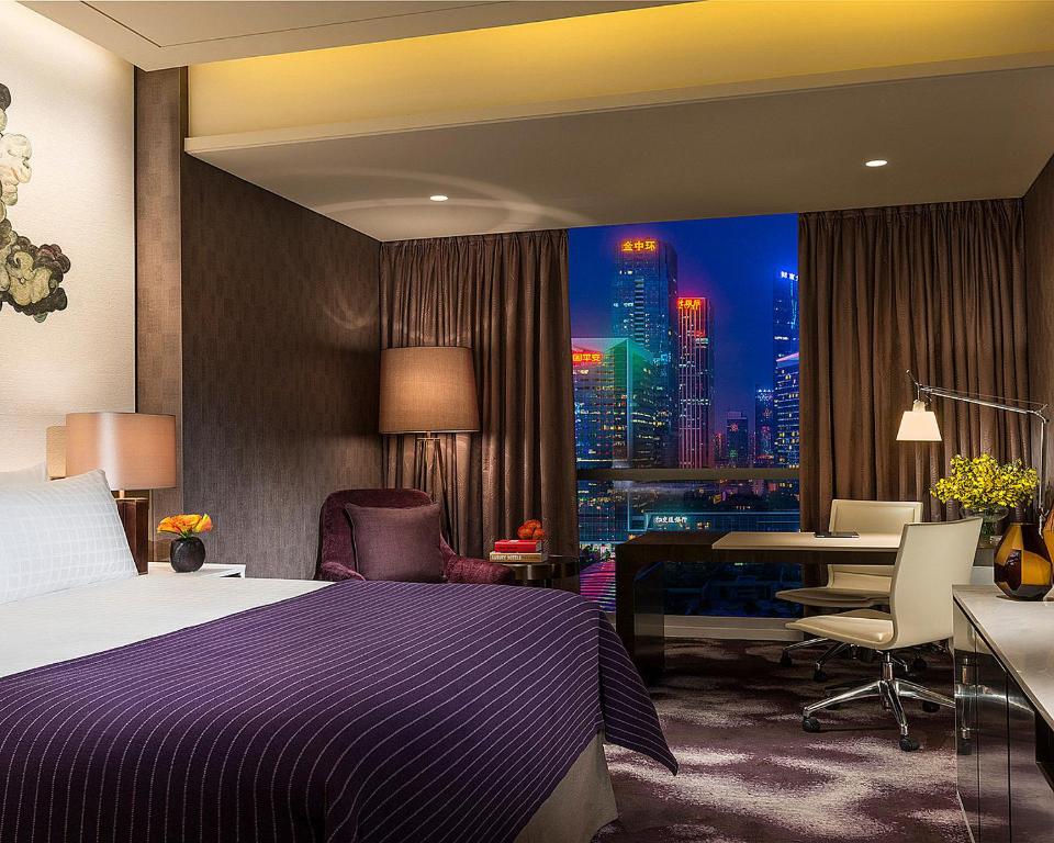 Postel nebo postele na pokoji v ubytování Four Seasons Hotel Shenzhen