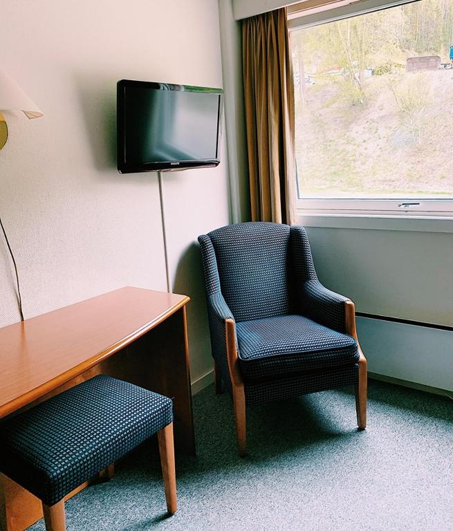 TV a/nebo společenská místnost v ubytování Rødberg Hotel