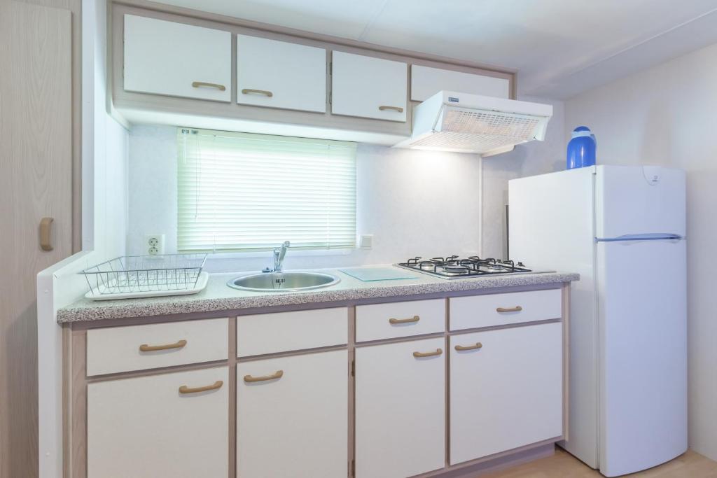 Kuchnia lub aneks kuchenny w obiekcie Camping Vicenza