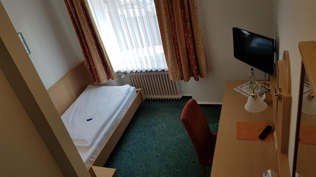 TV a/nebo společenská místnost v ubytování Hotel Gasthof Specht