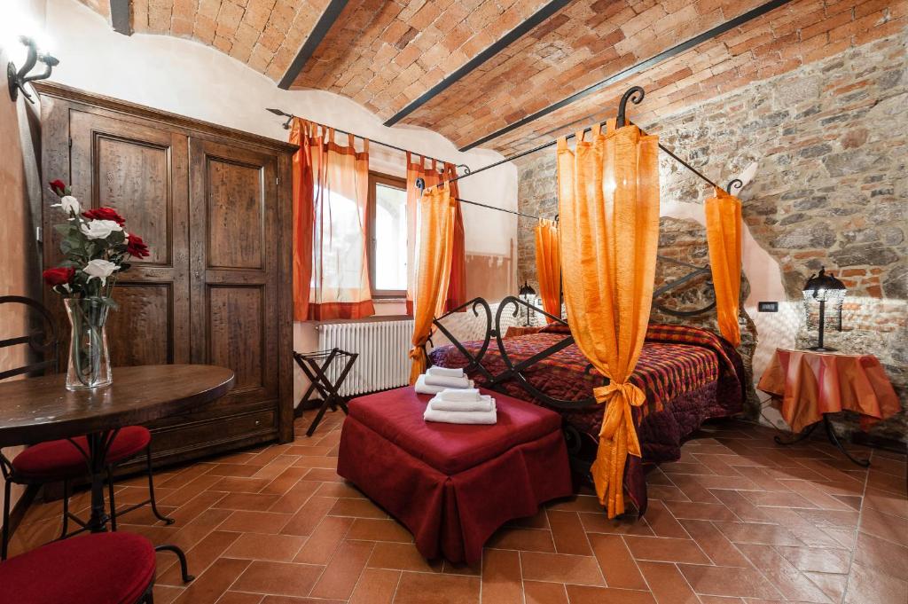Postel nebo postele na pokoji v ubytování Castello dei Templari