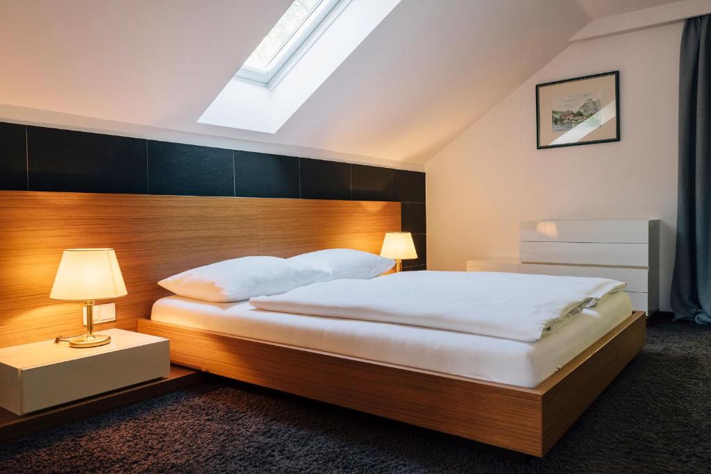 Posteľ alebo postele v izbe v ubytovaní PRIVATE SUITES