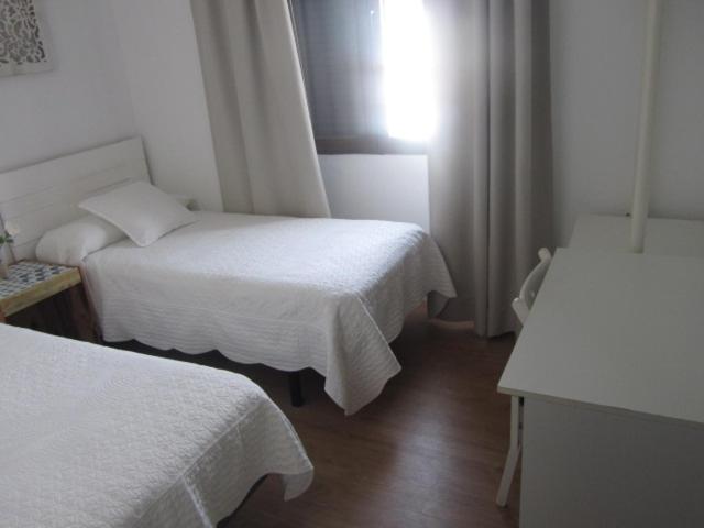 Posteľ alebo postele v izbe v ubytovaní Hospedaje Villanueva