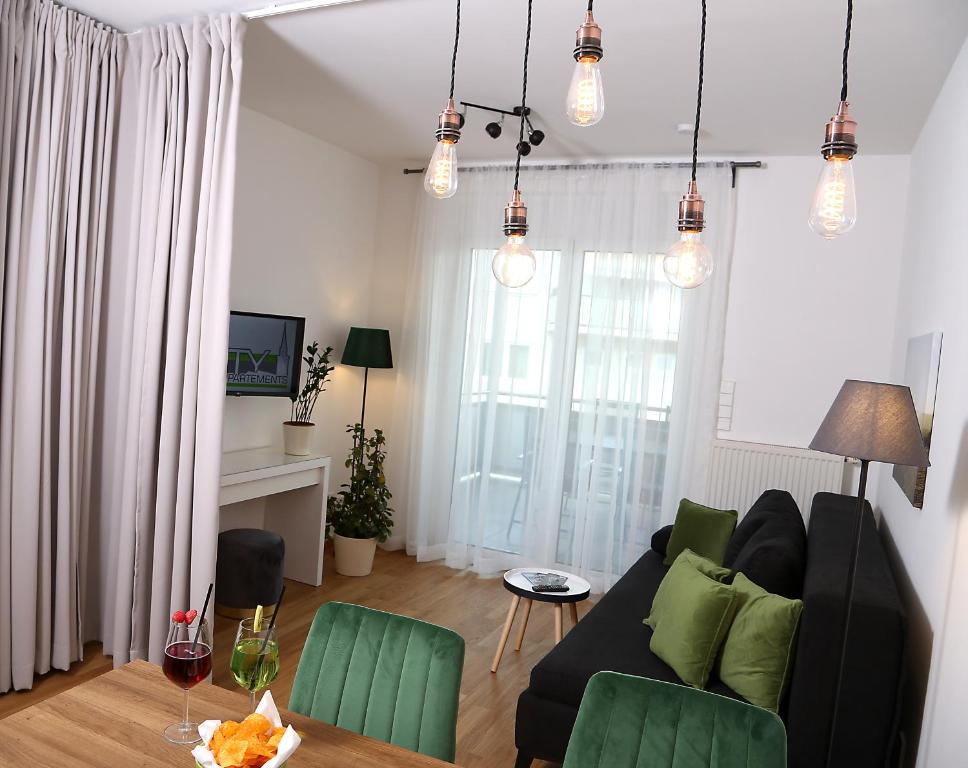 TV a/nebo společenská místnost v ubytování City Appartements Villach