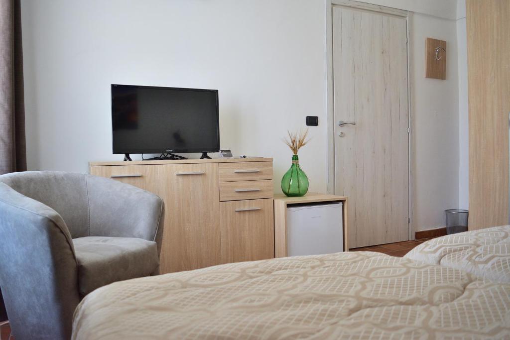 Telewizja i/lub zestaw kina domowego w obiekcie La Gravina