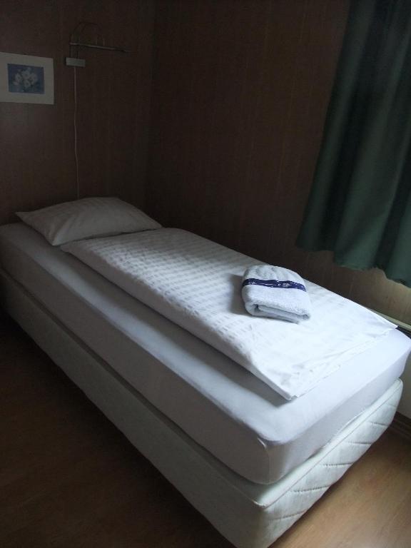Postel nebo postele na pokoji v ubytování apartment Neðra-Vatnshorn