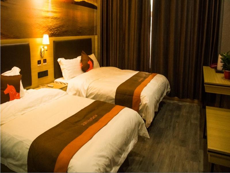 Voodi või voodid majutusasutuse JUN Hotels Xingtai Pingxiang County Jianshe Street toas