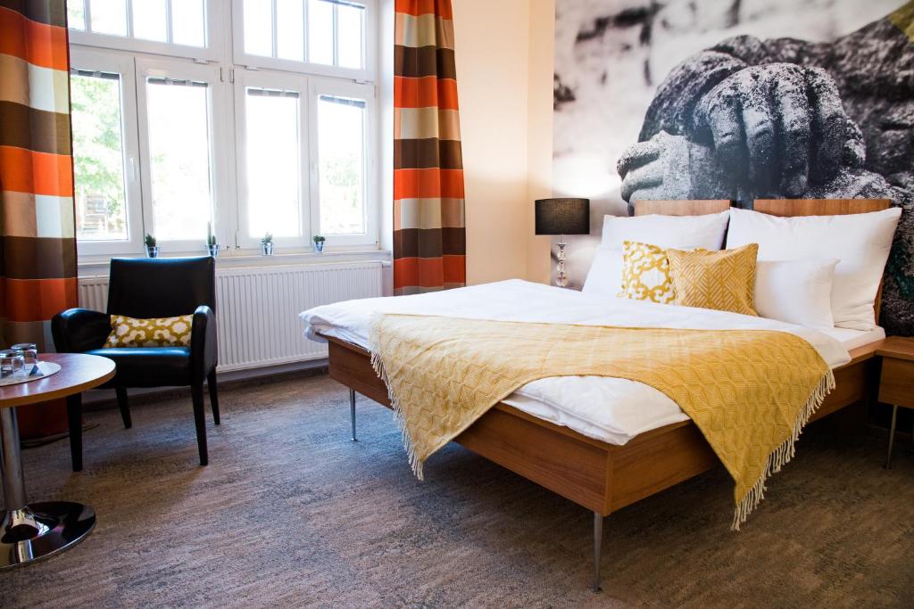 Postel nebo postele na pokoji v ubytování Boutique Hotel Golf Garni