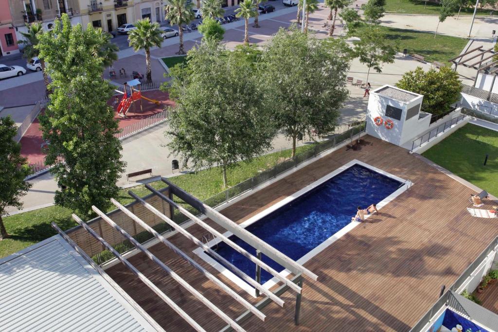 Bazén v ubytovaní 1217 - POOL AND BEACH NICE APARTMENT II alebo v jeho blízkosti