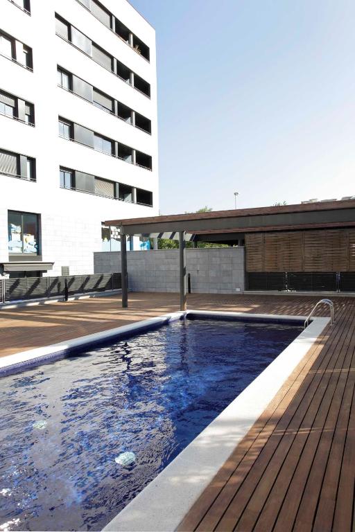 Bazén v ubytovaní 1217 - POOL AND BEACH NICE APARTMENT II alebo v jeho blízkosti