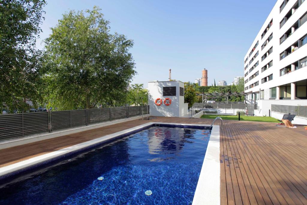 Bazén v ubytovaní 1217 - POOL AND BEACH NICE APARTMENT II alebo v jeho blízkosti