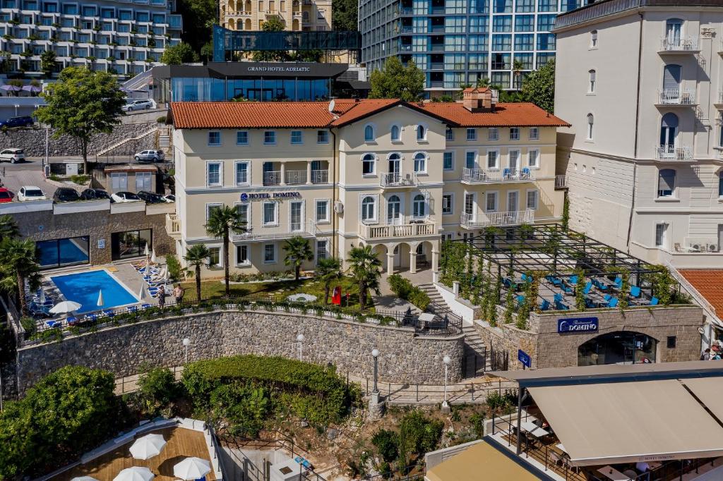 an aerial view of a building in a city at Hotel Domino in Opatija