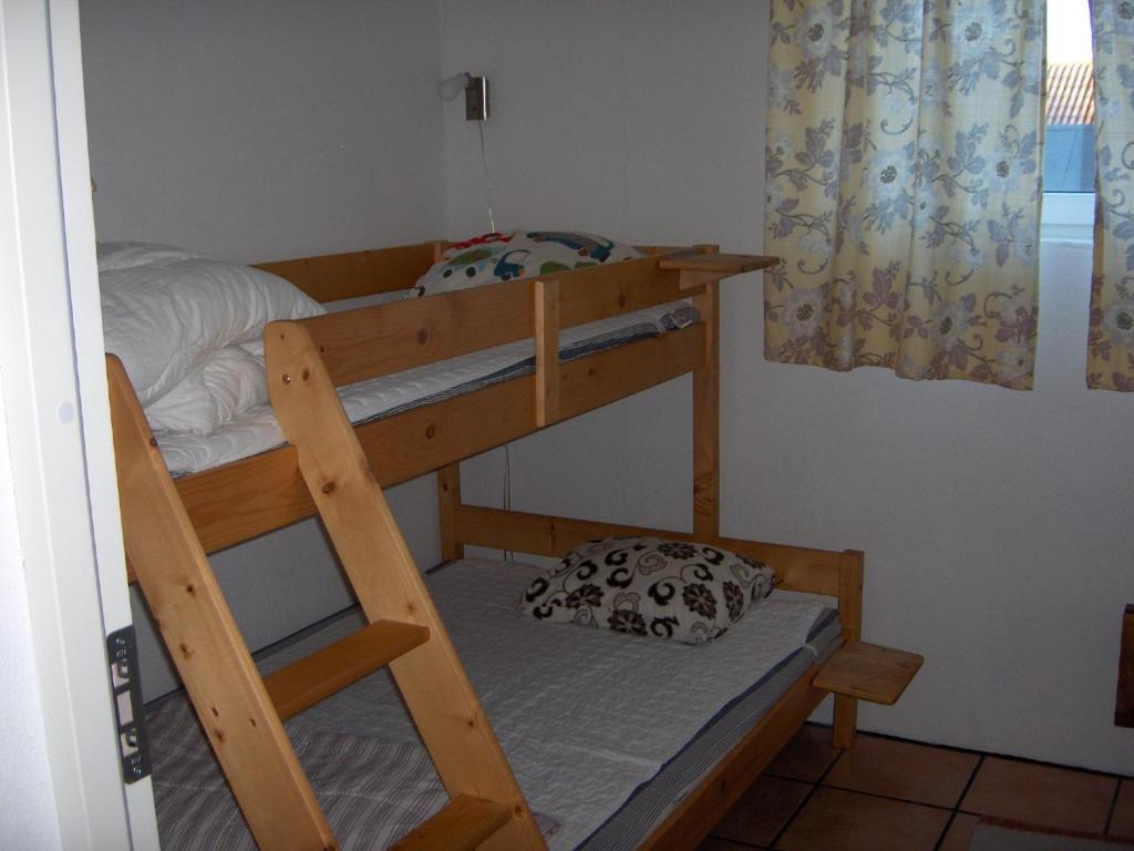 Postel nebo postele na pokoji v ubytování Bengtssons Loge