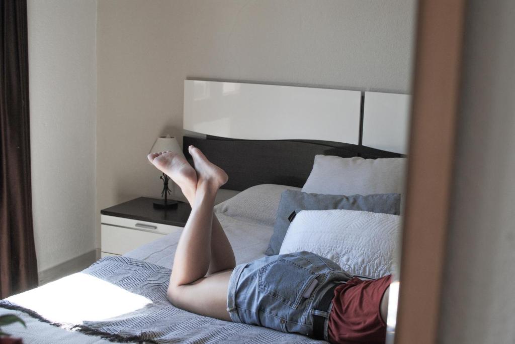 Postel nebo postele na pokoji v ubytování Fonda Mitjà