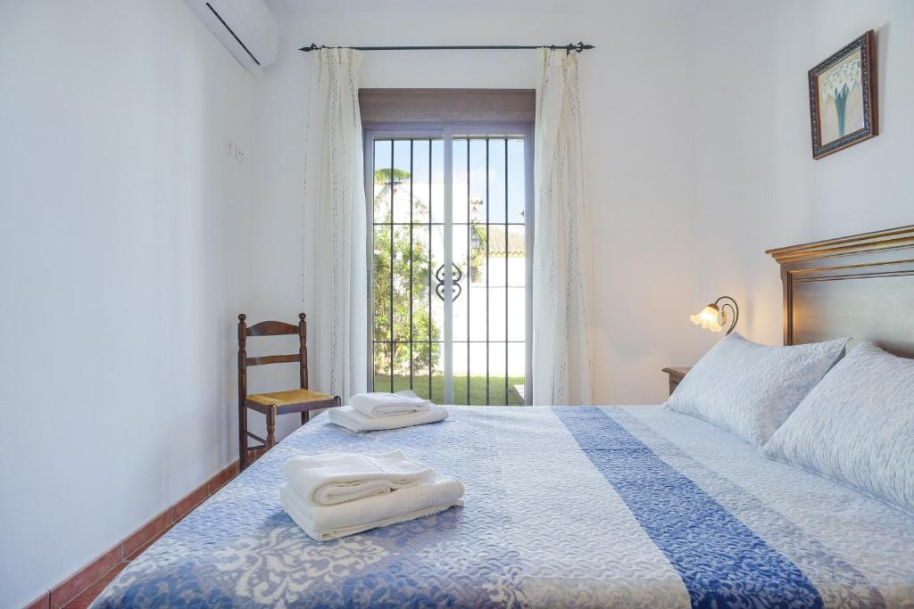 Postel nebo postele na pokoji v ubytování Chalet Villanueva - Sólo Familias
