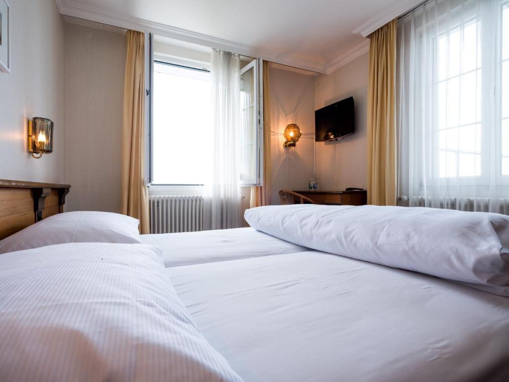 Ένα ή περισσότερα κρεβάτια σε δωμάτιο στο Landgasthof Hotel Menzberg