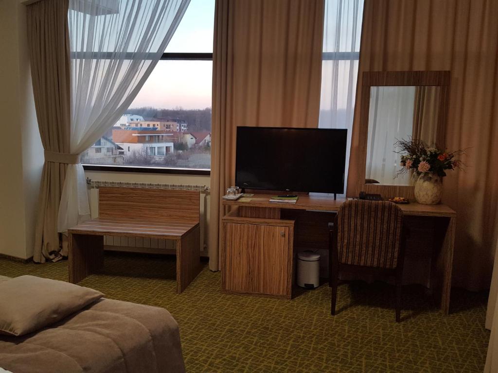 TV a/nebo společenská místnost v ubytování Hotel Tecadra