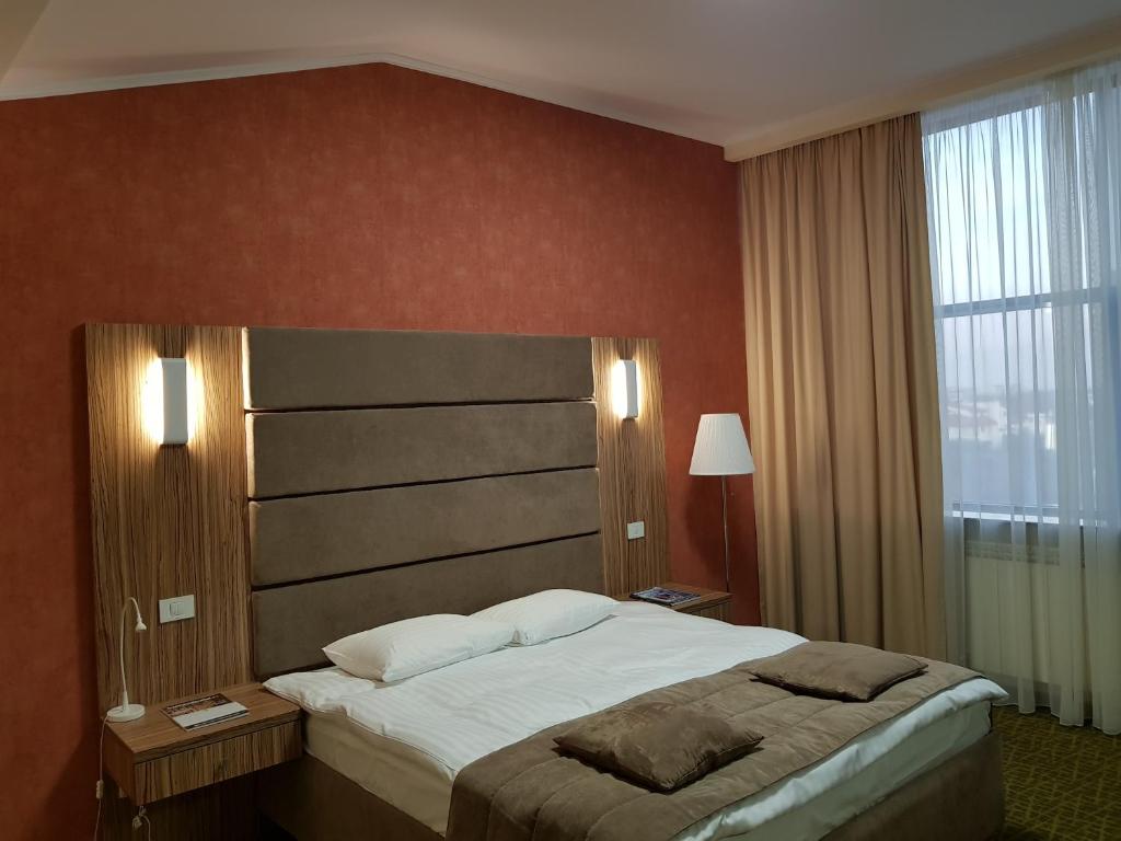 Postel nebo postele na pokoji v ubytování Hotel Tecadra