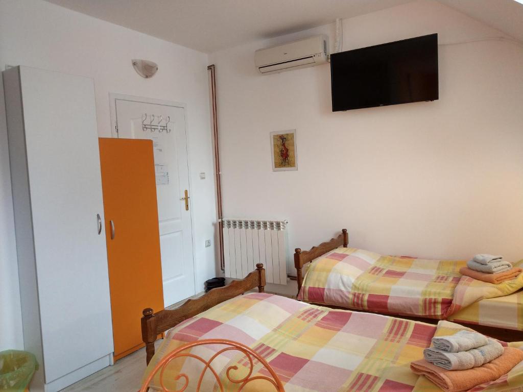 Katil atau katil-katil dalam bilik di Apartment Harmonija apatin