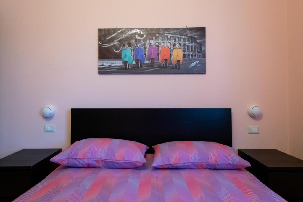 Łóżko lub łóżka w pokoju w obiekcie B&B Il castagno