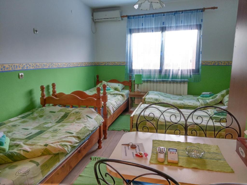 Katil atau katil-katil dalam bilik di Apartment Harmonija apatin