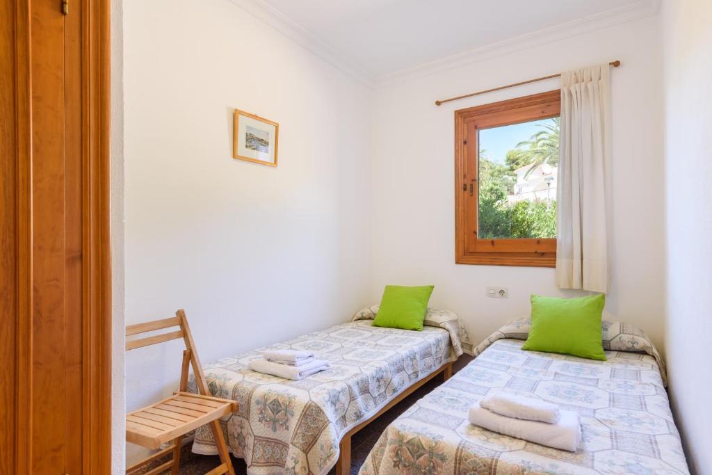 Postel nebo postele na pokoji v ubytování Villa Olivera