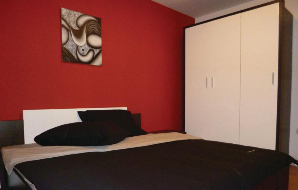 Postel nebo postele na pokoji v ubytování Appartement Stalno Sretan