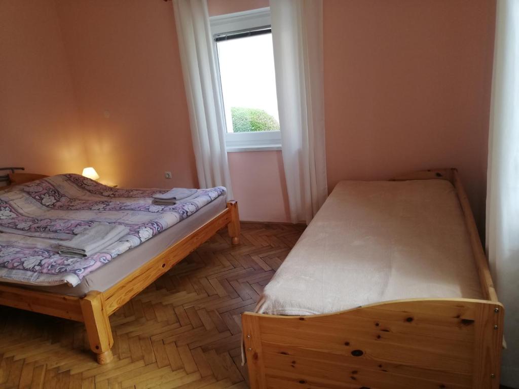 Postel nebo postele na pokoji v ubytování Apartments Mas