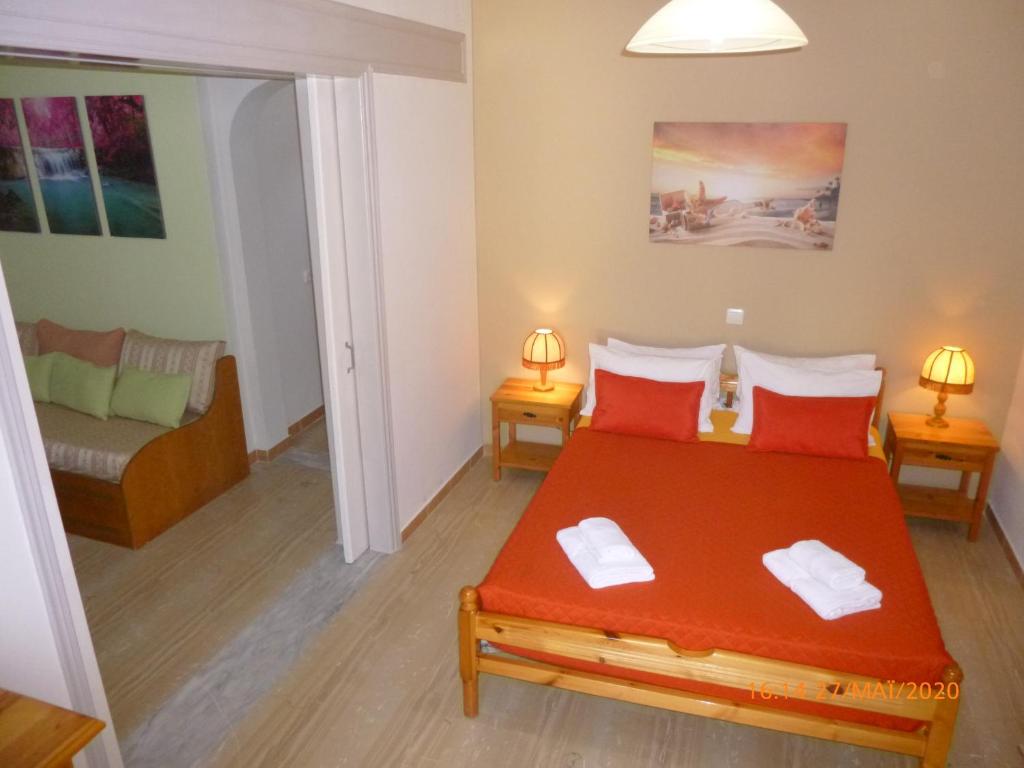 A bed or beds in a room at Bungalows Niki