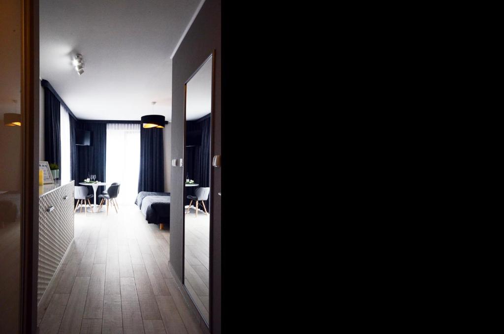 Posedenie v ubytovaní Apartamenty Biała Sowa Czarna Góra