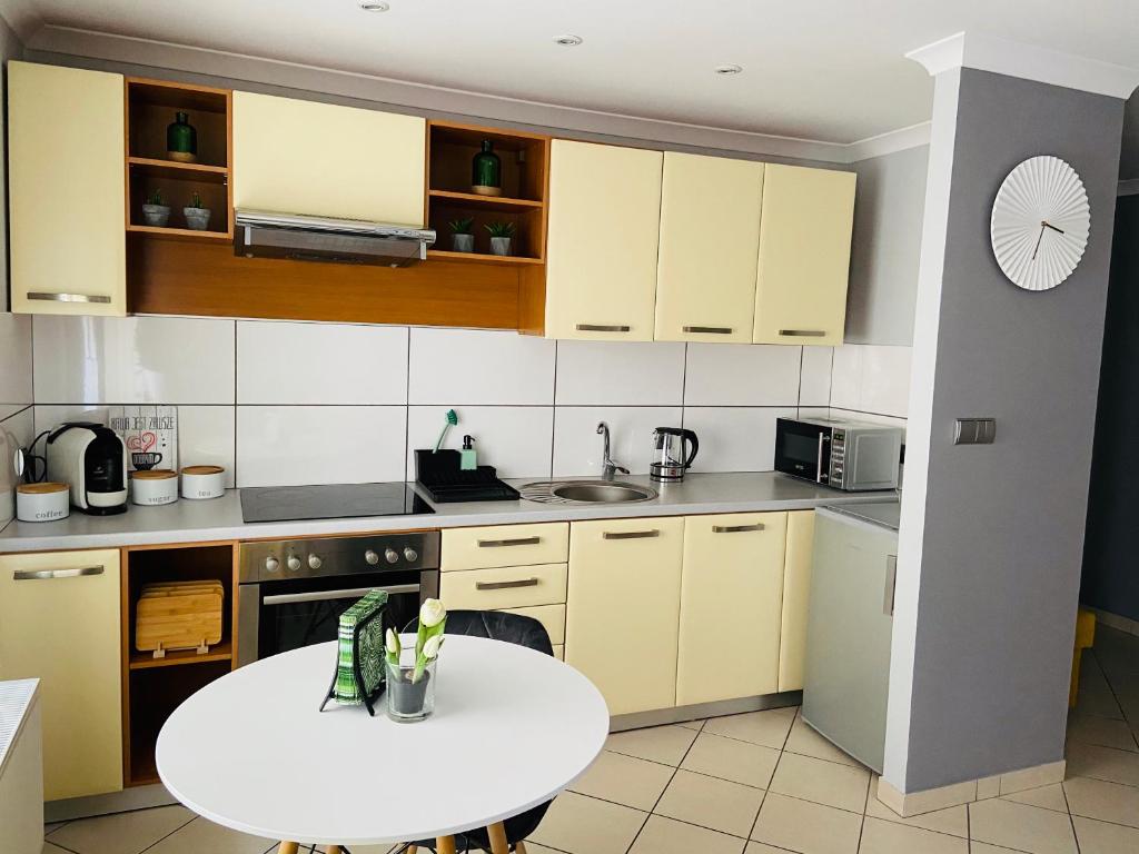 Kuchyňa alebo kuchynka v ubytovaní Apartament na Starówce III