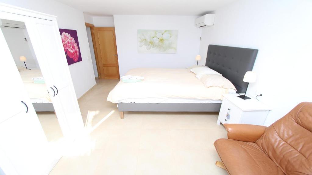 Postel nebo postele na pokoji v ubytování Villa Quinto Pino