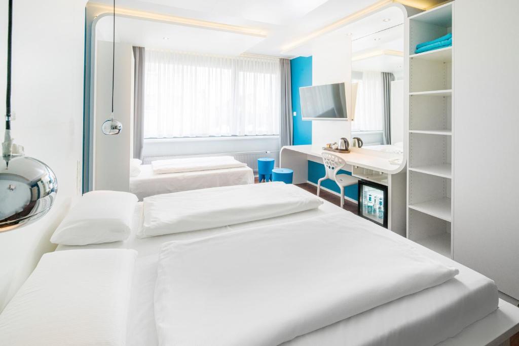 Postel nebo postele na pokoji v ubytování Hotel Knorz