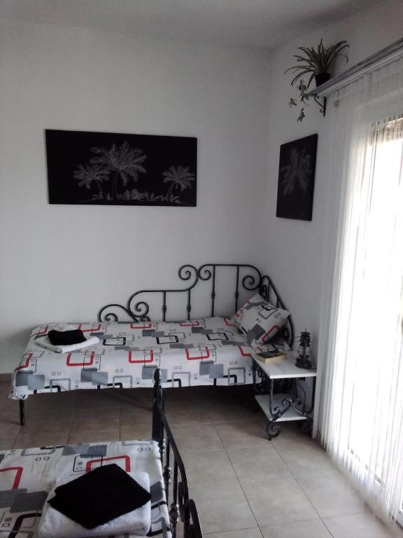 Voodi või voodid majutusasutuse Luštica Apartments toas